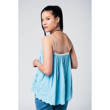 Blue top with white crochet detailing