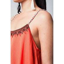 Orange top with aztec black and red embroidery