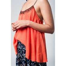 Orange top with aztec black and red embroidery