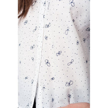 White blouse printed with black butterflies and dots