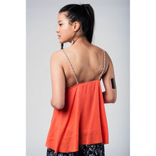Orange top with aztec black and red embroidery