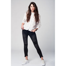 White blouse printed with black butterflies and dots
