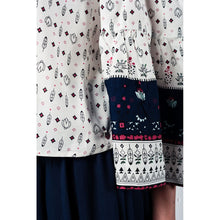 White navy off shoulders top with belled sleeves and floral print